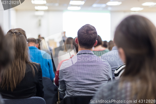 Image of Woman giving presentation on business conference.