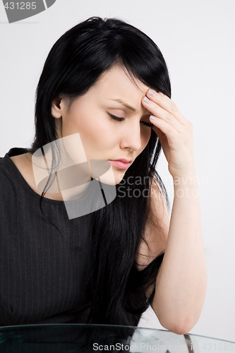 Image of Stressed businesswoman