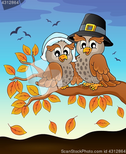 Image of Happy Thanksgiving owls on branch