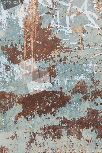 Image of Rusty metal surface with blue paint