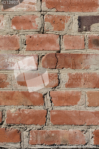 Image of The crack in the brick wall.