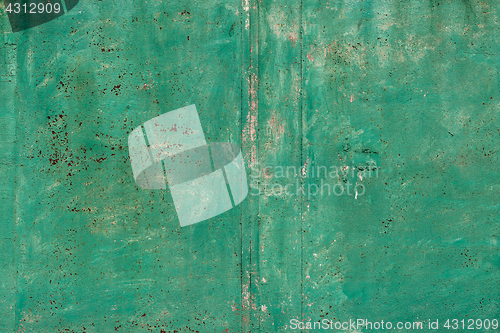 Image of Rusty metal surface with blue paint