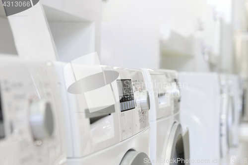 Image of washing machines in appliance store