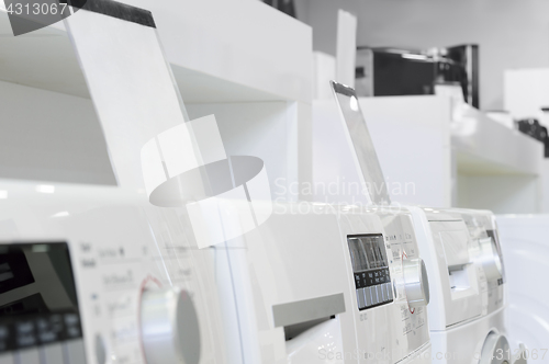 Image of washing machines in appliance store