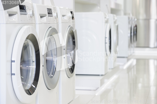 Image of washing machines in appliance store