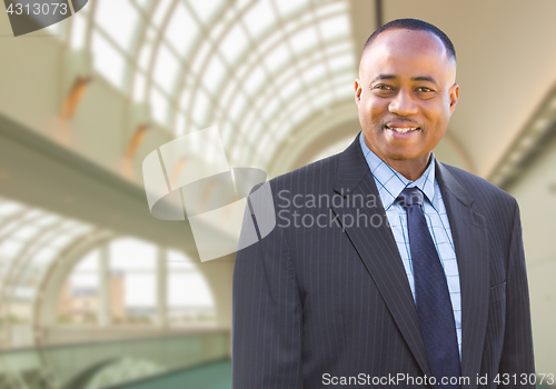 Image of Handsome African American Businessman Inside Corporate Building.