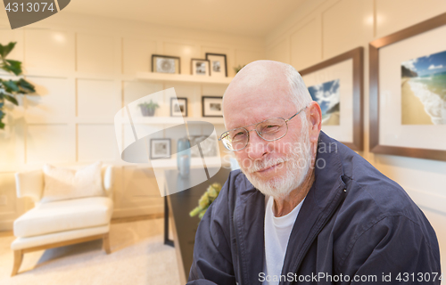 Image of Senior Man Inside His Home Office.