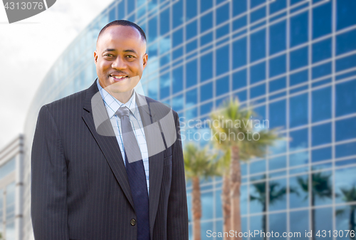 Image of Handsome African American Businessman In Front of Corporate Buil