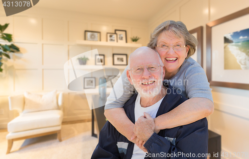 Image of Loving Senior Couple Inside Their Home Office.