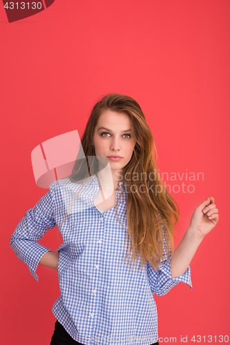 Image of woman playing with her long silky hair