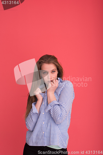 Image of woman playing with her long silky hair