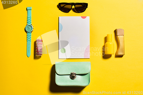 Image of Still life of fashion woman, objects on yellow