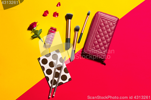 Image of Still life of fashion woman, objects on yellow table