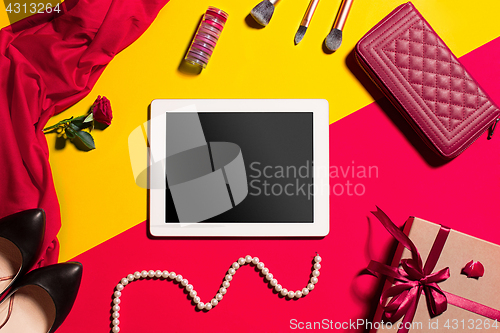 Image of Still life of fashion woman, objects on yellow table