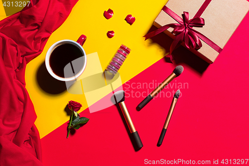 Image of Still life of fashion woman, objects on yellow table