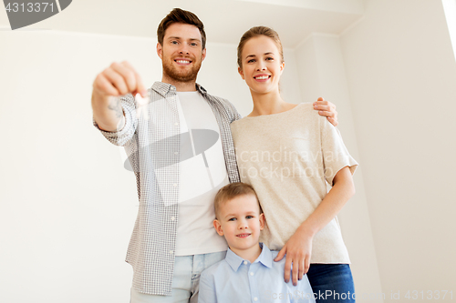 Image of happy family with key moving to new home