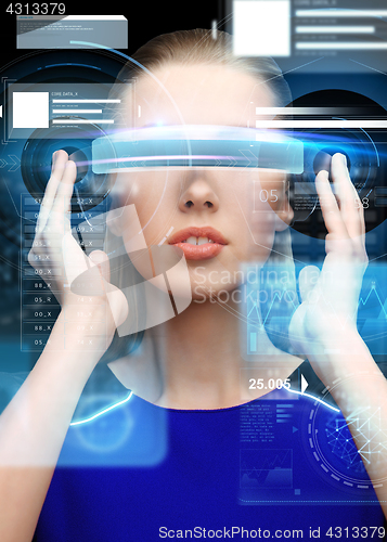 Image of woman in virtual reality 3d glasses with charts