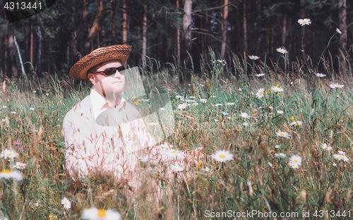 Image of Man Rest On The Forest Lawn