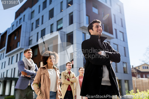 Image of international group of people on city street