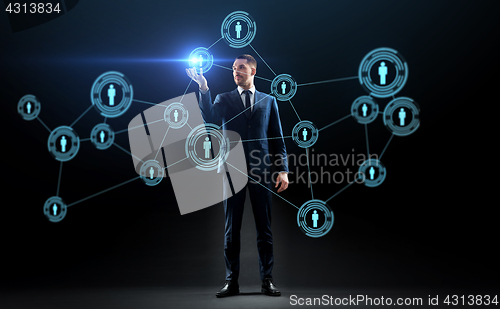 Image of businessman with virtual network contacts