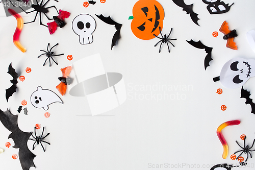 Image of halloween party paper decorations and sweets