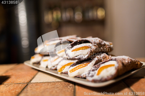 Image of pastry on plate at bakery