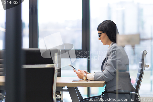 Image of Businesswoman using tablet