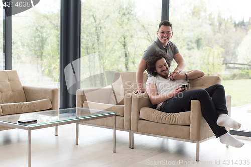 Image of Gay Couple Love Home Concept