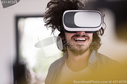 Image of man using VR-headset glasses of virtual reality