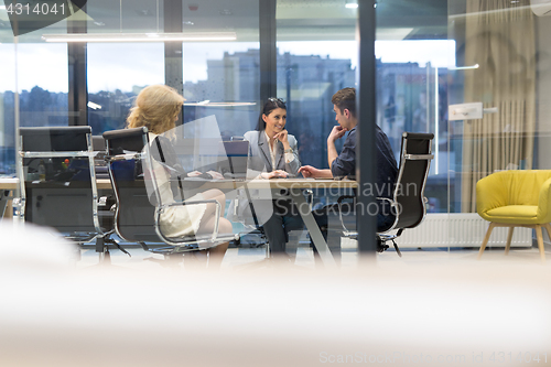 Image of Startup Business Team At A Meeting at modern office building