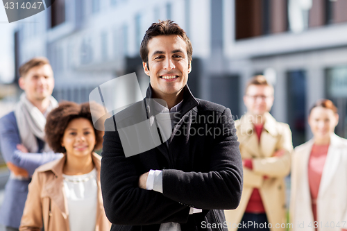 Image of international group of people on city street