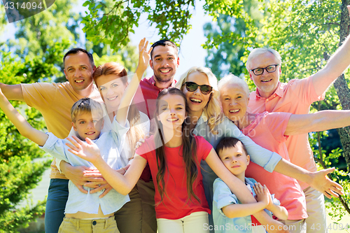 Image of happy family portrait in summer garden