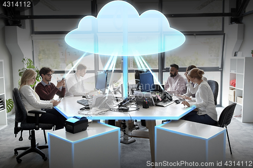 Image of business team with cloud computing hologram