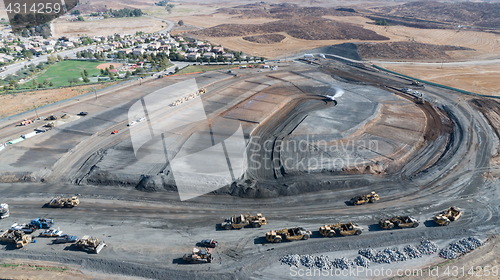 Image of Aerial View Of Tractors On A Housing Development Construction Si