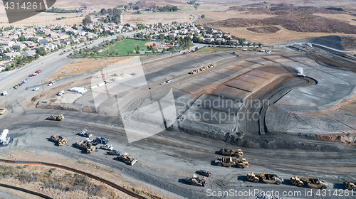 Image of Aerial View Of Tractors On A Housing Development Construction Si