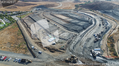 Image of Aerial View Of Tractors On A Housing Development Construction Si