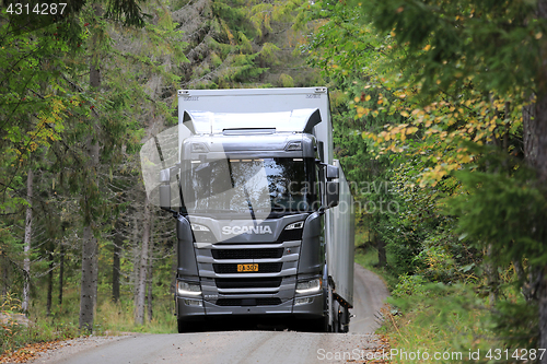 Image of Silver Next Generation Scania R500 Tractor Trailer on Forest Roa