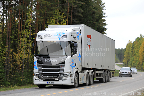 Image of White Next Generation Scania Semi on Highway