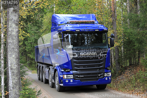 Image of Blue Scania R730 Truck for Construction on Forest Road