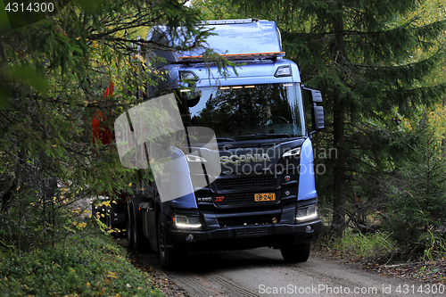 Image of New Scania XT Logging Truck on Dirt Road