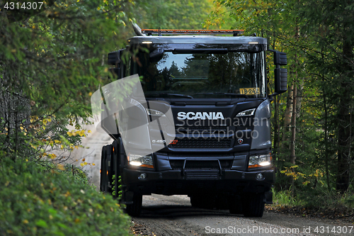 Image of Scania G450 XT Tipper Truck Off-Road Driving