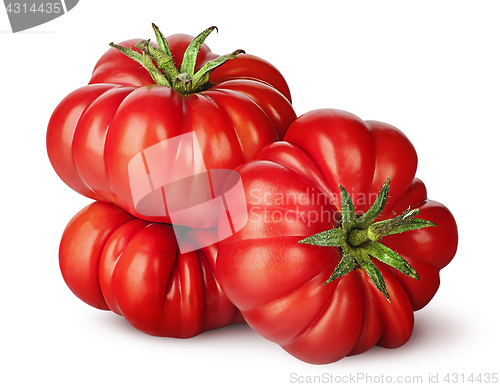 Image of Three tomatoes next to each other