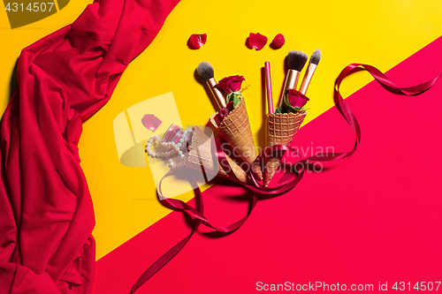 Image of Still life of fashion woman, objects on yellow table