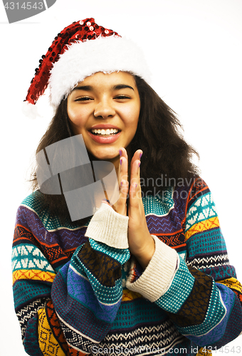 Image of cute young girl in santas red hat isolated