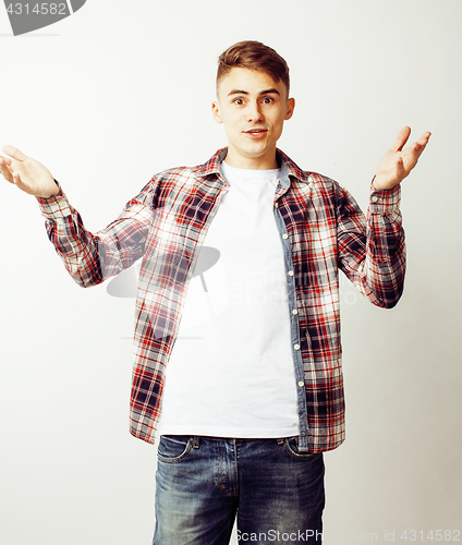 Image of young handsome teenage hipster guy posing emotional, happy smiling against white background isolated, lifestyle people concept 