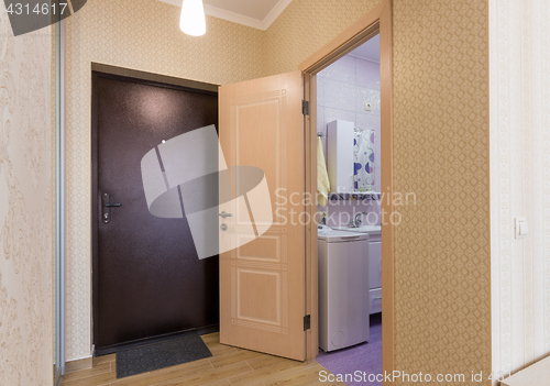 Image of Entrance hall, interior, front door and open door to the bathroom