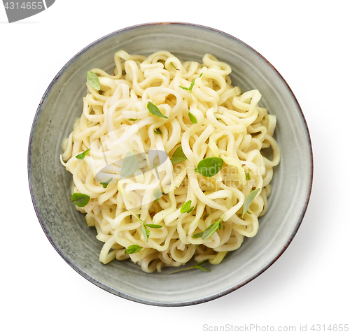 Image of Bowl of boiled egg noodles with spices and herbs