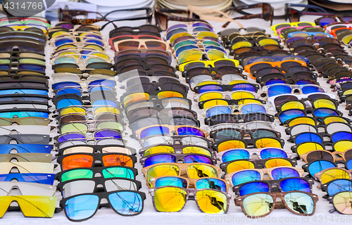 Image of Colorful Sunglasses for sale at street market
