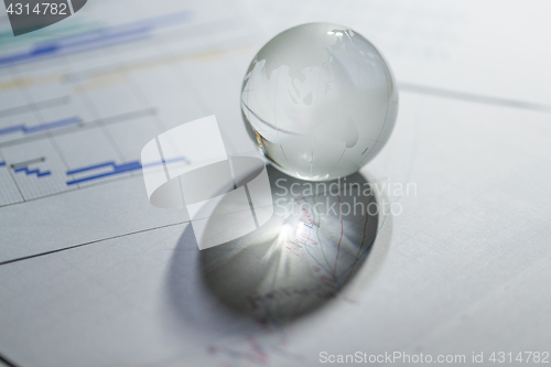 Image of Financial planning with glass globe