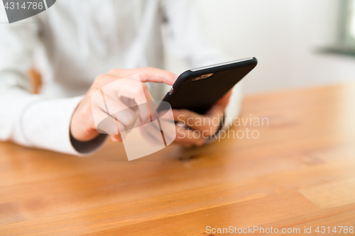 Image of Woman using notebook computer